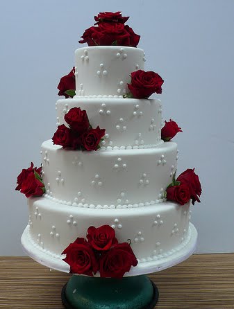 This wedding cake has some lovely edible pearls in the shape of a triangle