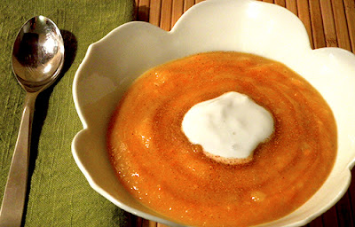 Bowl of Honey Butternut Soup with Honey and Yogurt Garnish