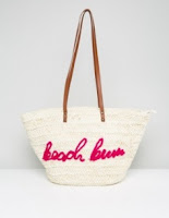 http://www.asos.com/missguided/missguided-beach-bum-slogan-straw-bag/prd/7844723?clr=pink&SearchQuery=BEACH&pgesize=36&pge=15&totalstyles=5579&gridsize=3&gridrow=3&gridcolumn=1