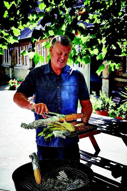 Dan Toombs - The Curry Guy cooking corn on the BBQ