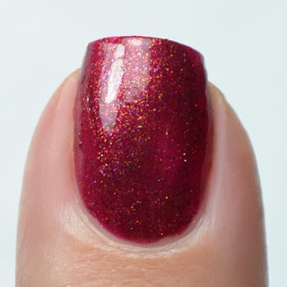 red shimmer nail polish swatch