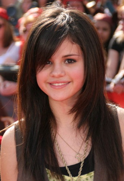 selena gomez hair short curly. Selena Gomez hair style