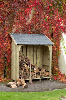 An Okeford Logstore with Slate effect roof