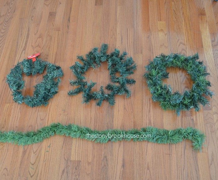 Adding garland to Dollar Tree wreaths