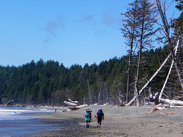 Two Backpackers on the Beach Trail