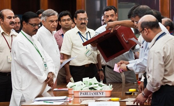 Sh. Satya Pal Jain, Counting Agent of Sh. P A Sangma, and Sh. Pawan Bansal, Counting Agent of Sh. Pranab Mukherjee, during the counting of votes for the Presidential Election at Parliament House, New Delhi. | AFP/GettyImages/Prakash Singh