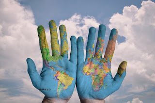 Globe painted on hands photo by stokpic at https://pixabay.com/photos/hands-world-map-global-earth-600497/