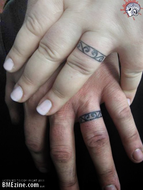 Mark and I are considering getting Best art wedding ring tattoo designs 