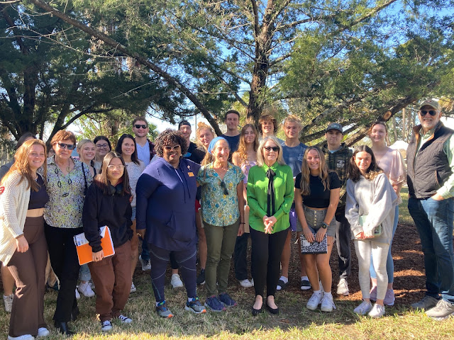 St. Augustine vice mayor Roxanne Horvath, city commissioner Cynthia Garris, city commissioner and Flagler College professor Barbara Blonder, St. Augustine Mayor Nancy Sikes-Kline, city commissioner Jim Springfield and Blonder's Flagler College ecology class at the annual Arbor Day celebration.