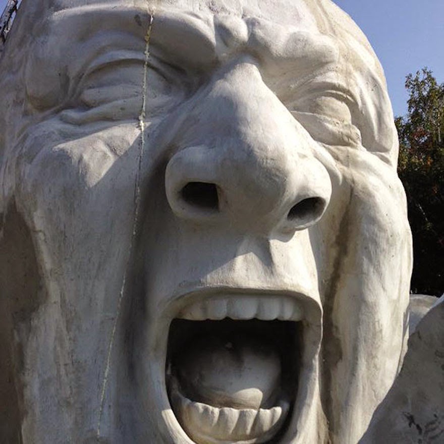 A Giant Sculpture Crawls Out Of The Ground In Public Square Of Budapest