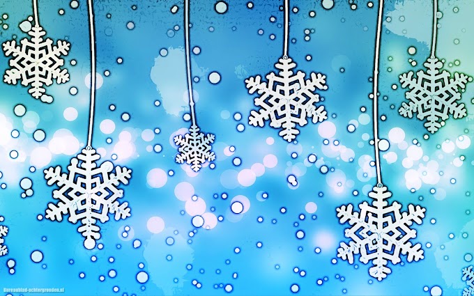 Blauwe winter wallpaper met sneeuwvlokken