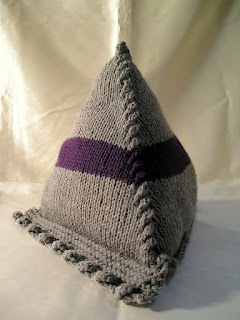 large knitted pyramid for tablets with purple stripe