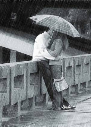 kissing in the rain black and white. couple kissing in rain.