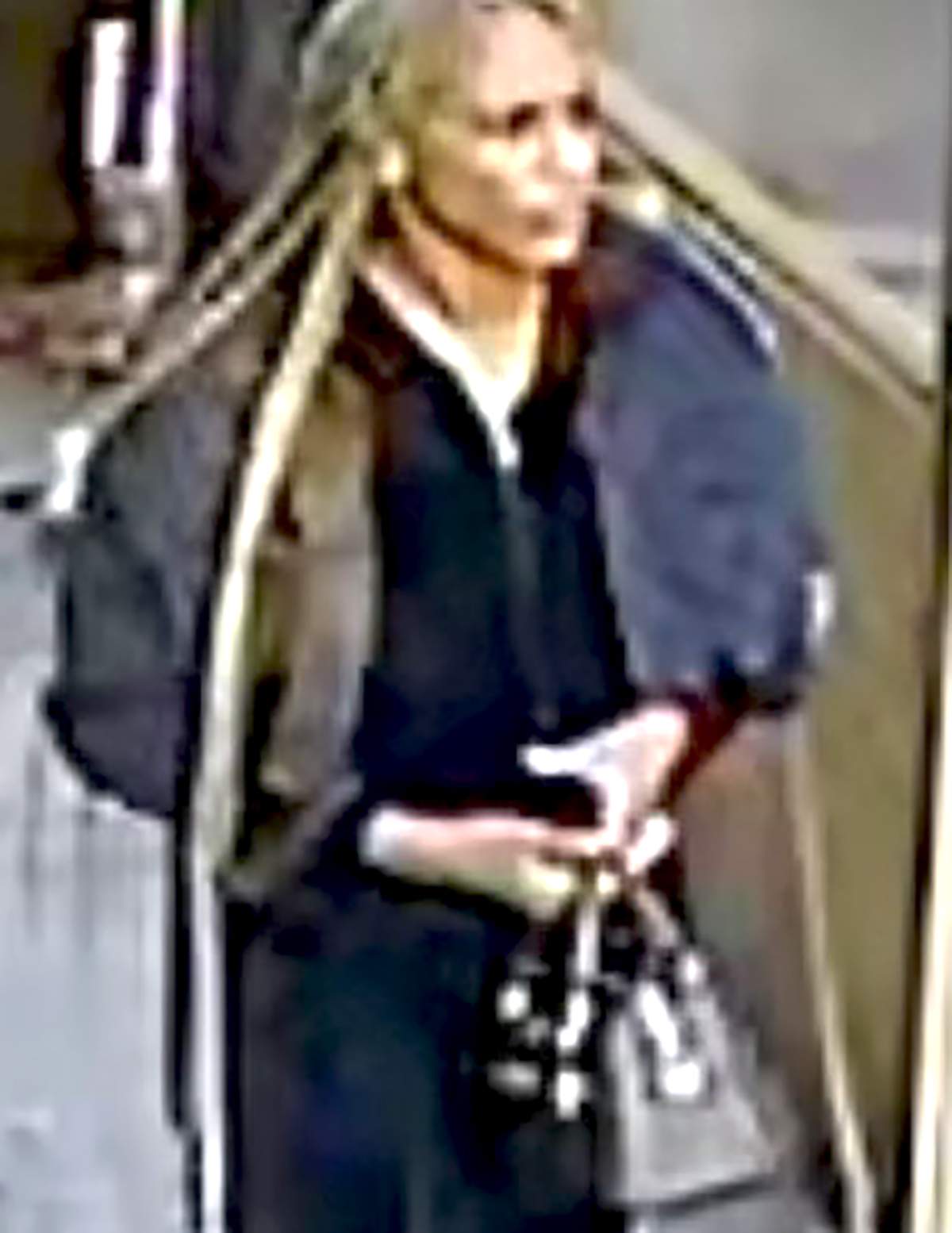 The NYPD is searching for this woman in connection with a stabbing of a man outside a Midtown restaurant. -Photo by NYPD