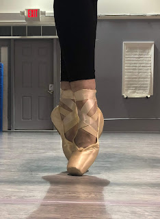 A Ballerina on Pointe Demonstrating Bad Technique 