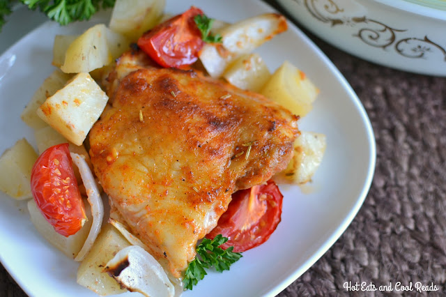 Super easy and delicious chicken with potatoes, tomatoes, onions and garlic! Enough for the whole family and bakes in one hour! One Pan Baked Paprika Chicken with Vegetables Recipe from Hot Eats and Cool Reads