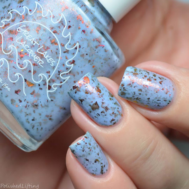 pale blue nail polish with color shifting flake