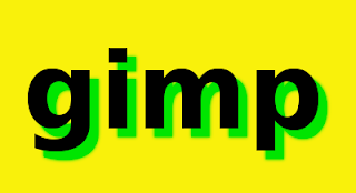 palavra Gimp na cor preta, sombra verde, com fundo amarelo