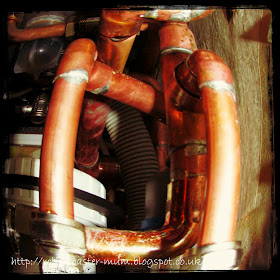 copper pipework on boiler
