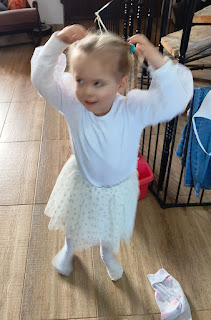 Rosie in her lovely white outfit