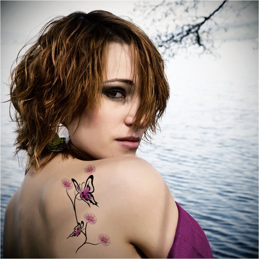 tattoo designs on shoulder for women sports: Flying Butterfly Tattoos