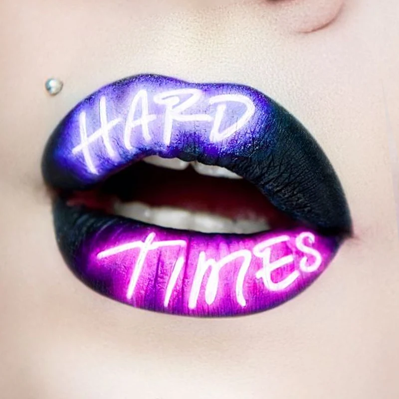 close-up of woman's lips with a neon lip look