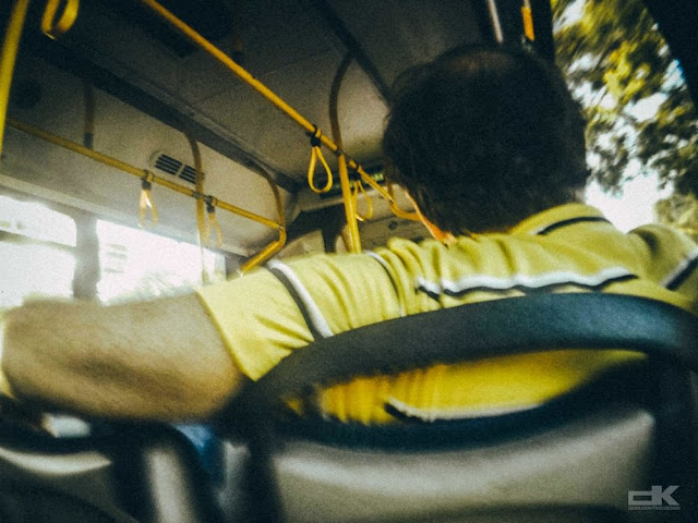 man with Yellow t-shirt in the bus