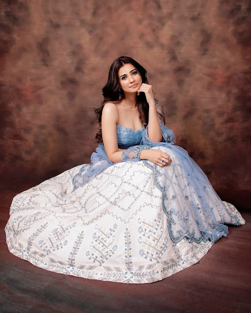 Daisy Shah photoshoot with white party wear dress