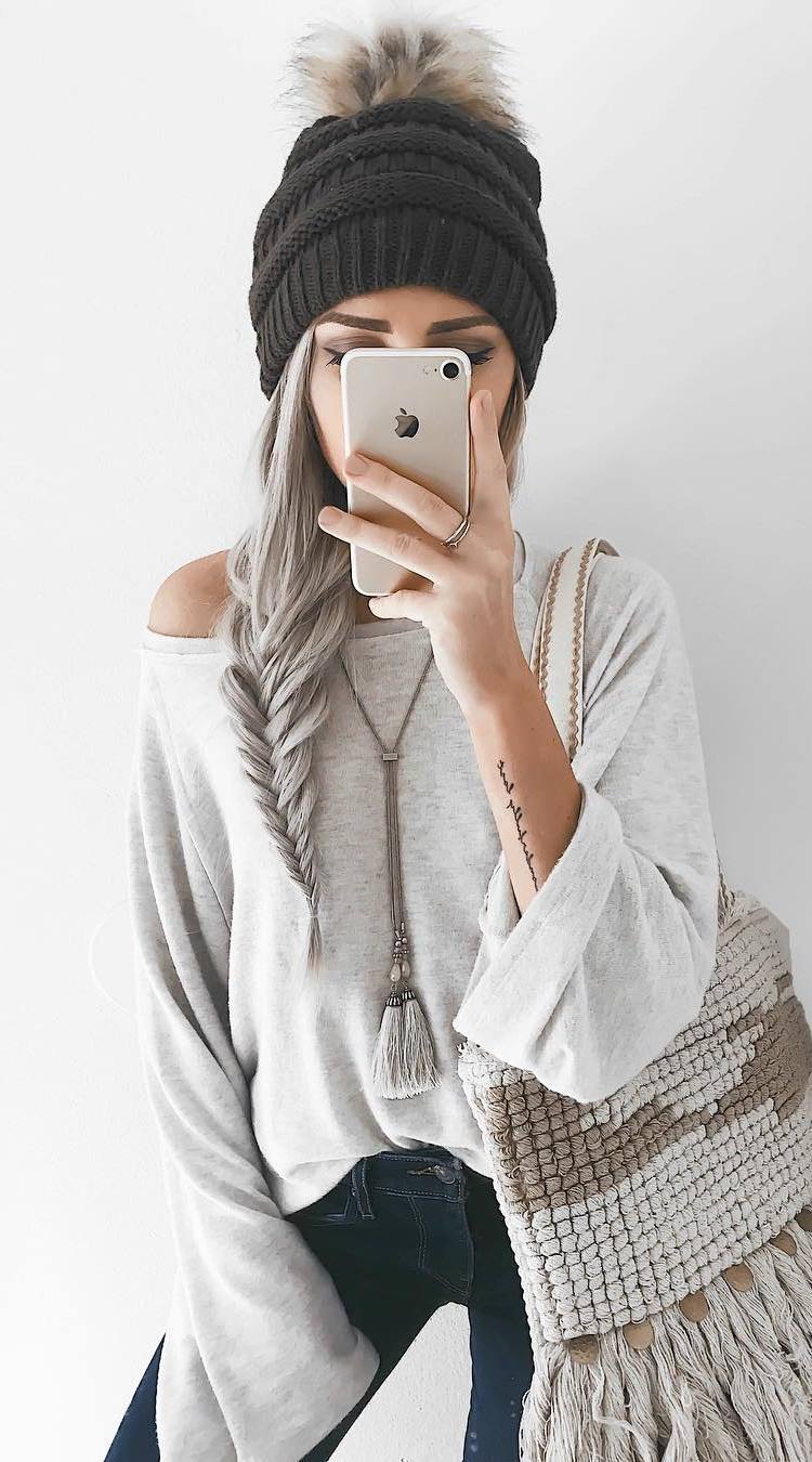 how to style a knit hat : one shoulder sweater + bag + skinny jeans
