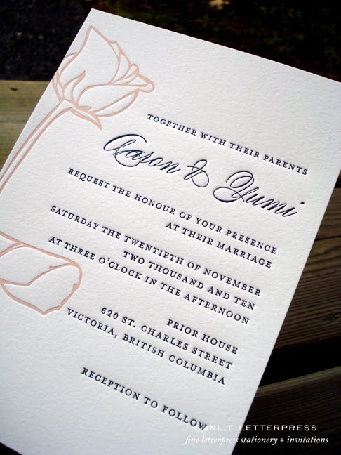 Above is a photo of custom letterpress wedding invitations we designed and