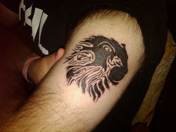The tenth of my Lion Tattoo Designs is this cute lil foot Lion Tattoo