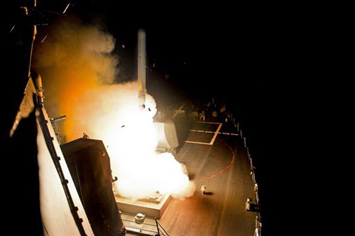 [Caption]The guided-missile destroyer USS Arleigh Burke launches aTomahawk cruise missile in the Persian Gulf, Sept. 23, 2014, to conduct strikes against targets in the Islamic State of Iraq and the Levant, or ISIL. 