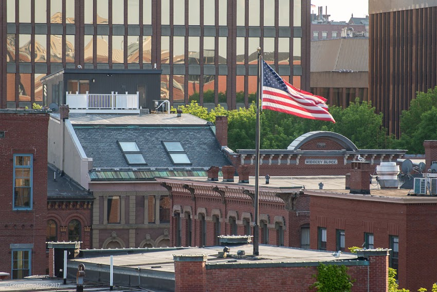 Portland, Maine USA June 2017 photo by Corey Templeton of an American flag catching some wind above the Old Port