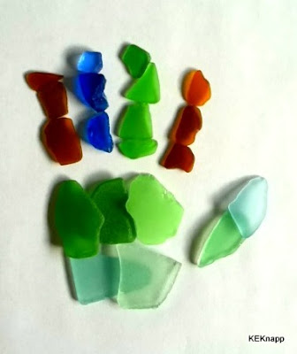 Hand created from my Mom's sea glass collection.. love the colors!