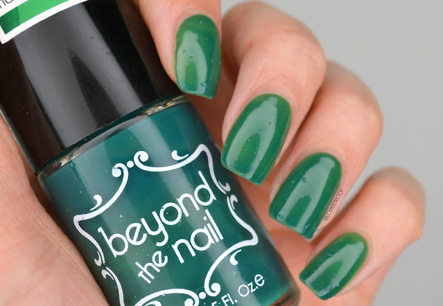 beyond the nail green thermal nail polish swatch holding bottle