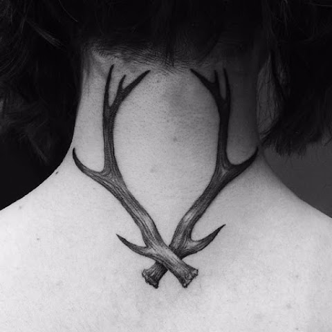 Out Of The Woods With These Lovely Antler Tattoos