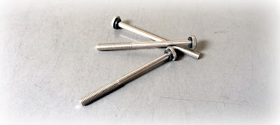 Special/custom stainless steel phillips pan captive screw with o-rings - Engineered Source is a supplier and distributor of special/custom captive screws with o-rings in stainless steel and steel zinc - covering Santa Ana, Orange County, San Diego, Los Angeles, Inland Empire, California, United States, Mexico