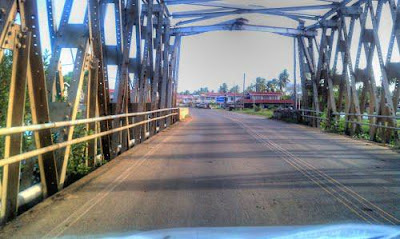 Bridge over Anamoromise Creek. It appears the image was taken on the bridge  pointing towards 66 village.