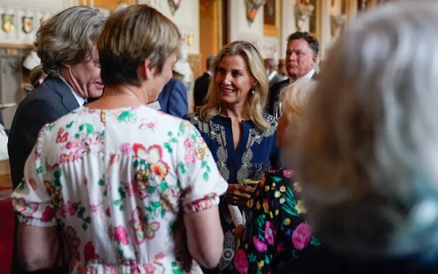 The Duchess of Edinburgh wore a new printed midi dress by Etro. The Duchess of Gloucester wore a printed jacket and black trousers