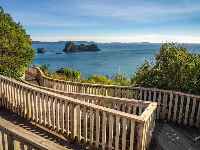 There are a few sets of stairs to and from the water at Cathedral Cove