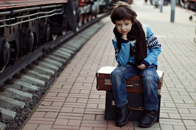 Image: Boy Sitting on Suitcase, by Victoria Borodinova on Pixabay