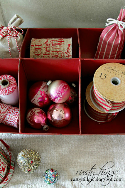 Christmas vignette in a red metal divider tray