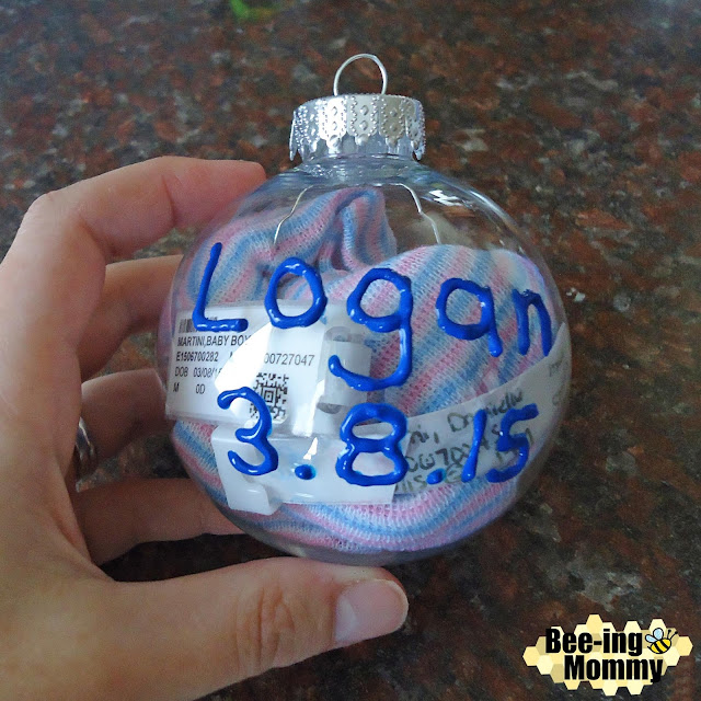 Baby's First Keepsake Ornament, baby ornament, keepsake ornament, keepsake, personalized ornament, hospital hat ornament, baby's first ornament, ornament idea, newborn baby ornament, first Christmas ornament, scrapbook ornament, meaningful ornament, baby boy ornament, baby's first Christmas, baby, DIY, Puff paint