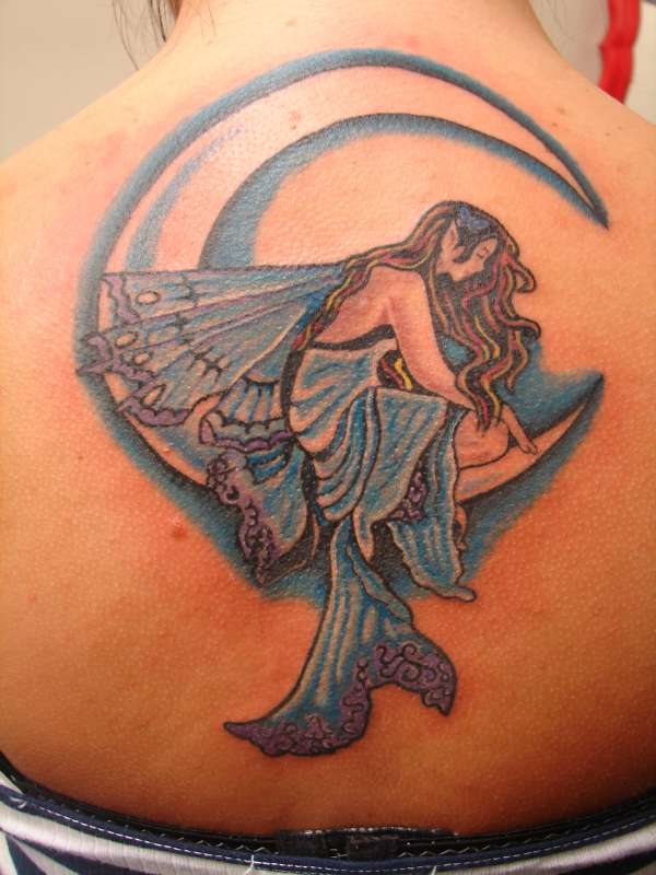Tribal Moon and Star Tattoo, Lower Back [Image Credit: sleepishly]