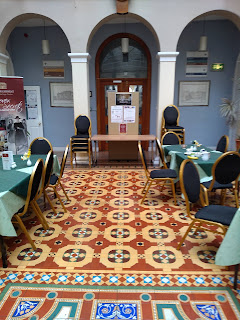 Dining area with spectacular Victorian tiled floor