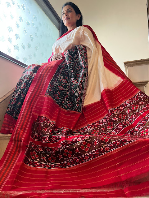 White pochampally silk saree with intricate skirt border