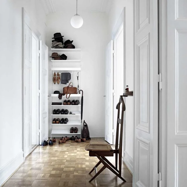 AN OPEN WALK-IN CLOSET FOR THE ENTRANCE