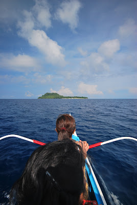 On a boat traversing the sea to Cuatro Islands