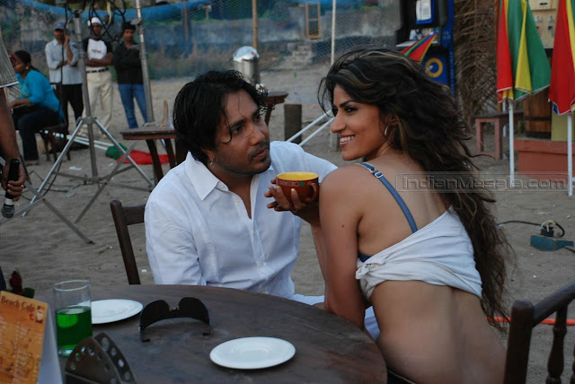 Mika Singh Enjoying with a Hot Model in Short dress