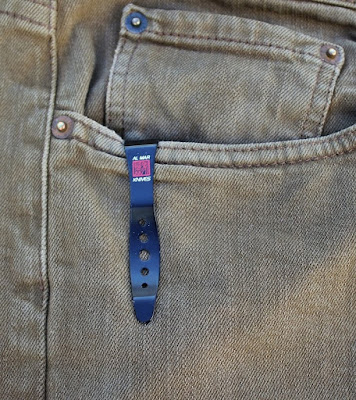 The pocket clip hides the entire knife